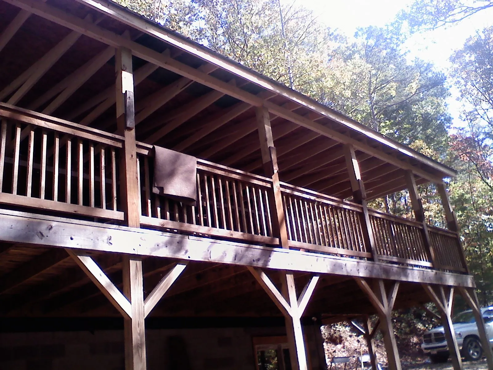 Timber framing under a new elevated porch and deck — Roof Leak Repair in Elba by Roofing Brothers